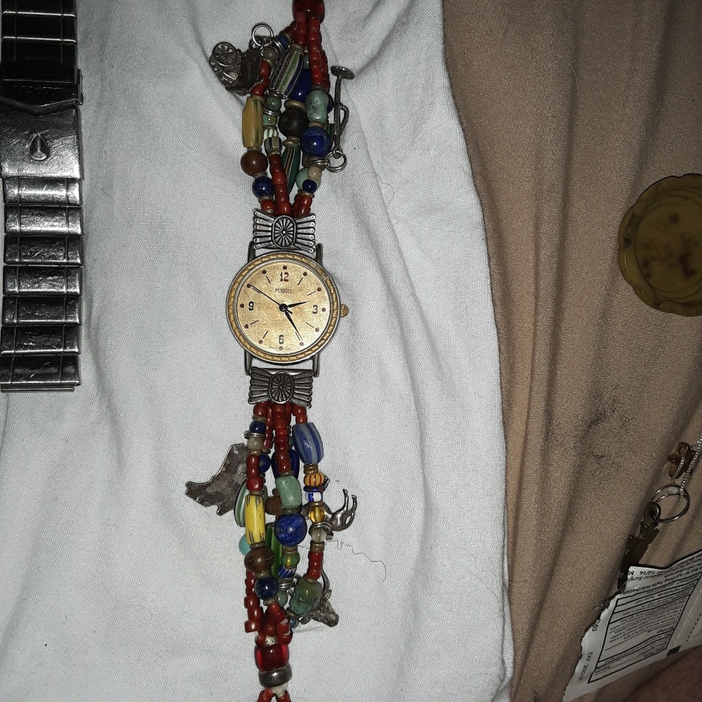 Vintage Fossil women's charm bracelet watch
